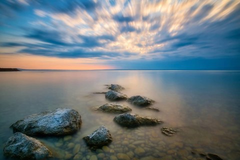 Atmospheric clouds at sunrise on Lake Constance