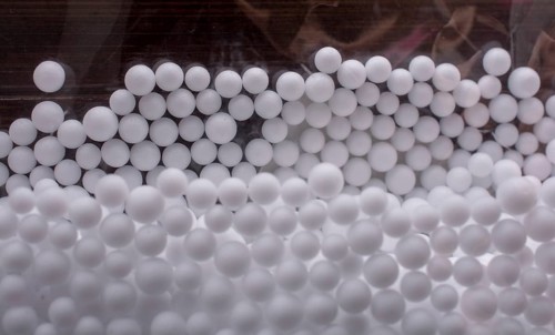 White little polystyrene foam balls as background