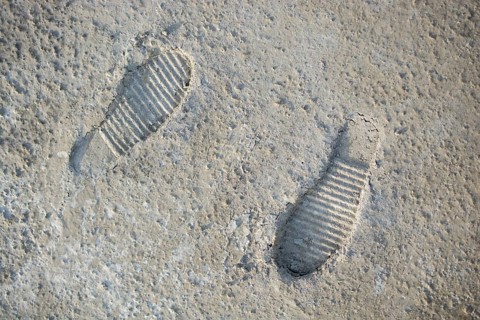 Footstep pattern seen on a concrete background