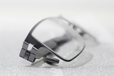 Financial Newspaper and Eyeglasses
