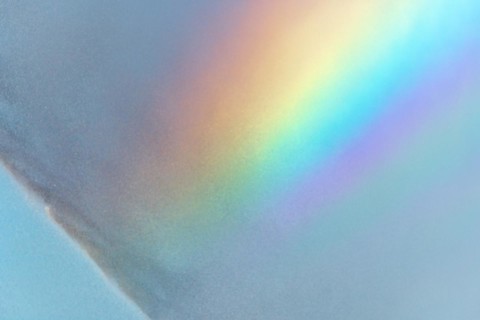 Rainbow colours in the water flow of an agricultural sprinkler system. Bas-Rhin