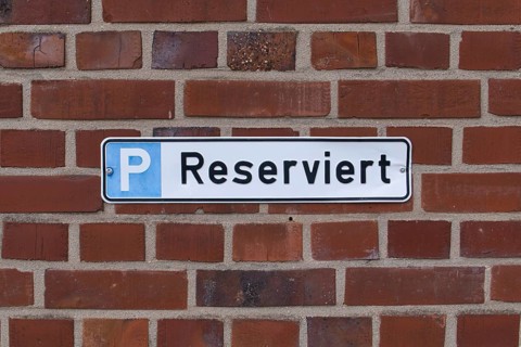 Sign with inscription Reserved