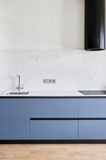 A modern kitchen with gleaming household equipment
