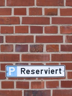 Sign with inscription Reserved