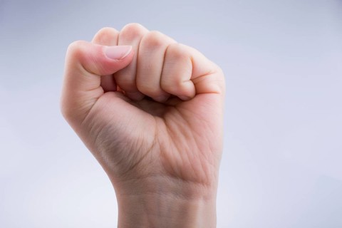 Clenched fist on a white background