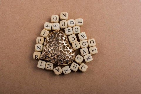 Metal Love icon and Letter cubes of made of wood