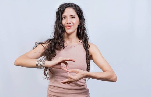 People speaking in sign language isolated. Young woman gesturing in sign language
