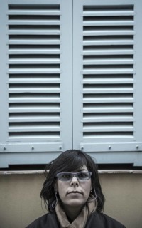 Woman Under a Window with Shutter