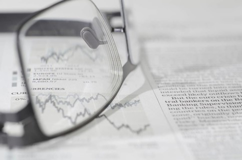 Financial Newspaper and Eyeglasses