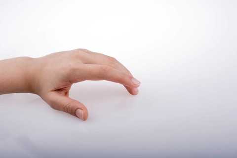 Hand holding on a white background