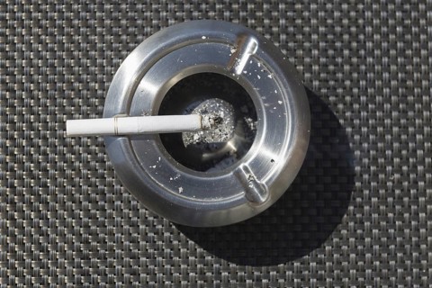 Ashtray with a cigarette