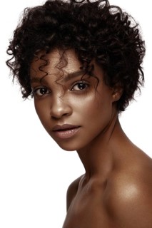 African American skincare models with perfect skin and curly hair. Beauty spa treatment concept