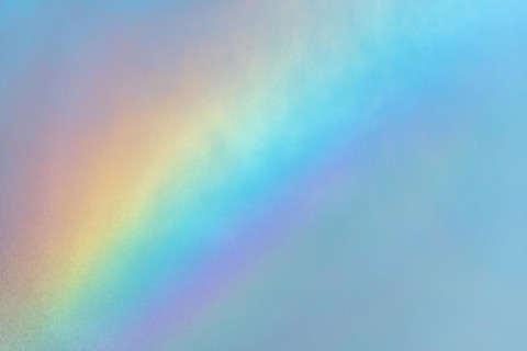 Rainbow colours in the water flow of an agricultural sprinkler system. Bas-Rhin
