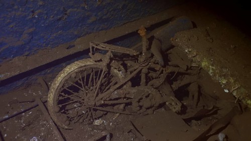 Bicycle luggage and personal belongings of passengers lie inside hold of ferry Salem Express shipwreck