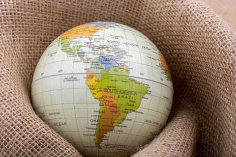 Linen canvas is wrapped around a model globe