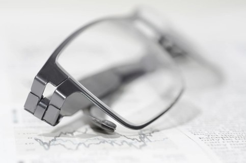 Financial Newspaper and Eyeglasses