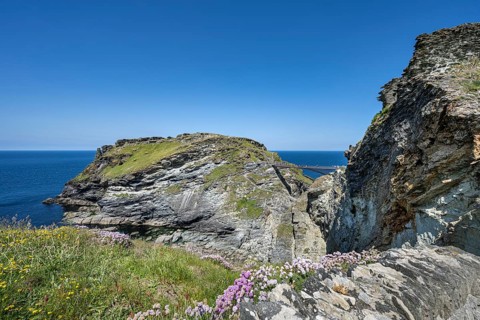 Rough cliffs with the Tintagel Peninsula and the ruins of Tintagel Castle