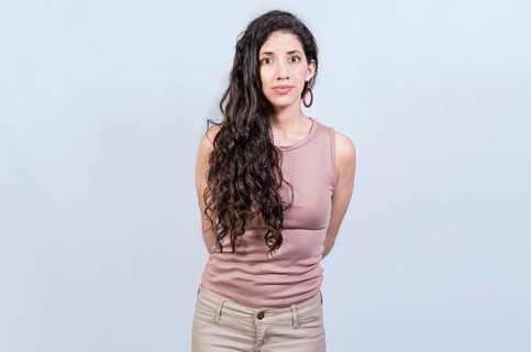 Portrait of attractive latin girl isolated. Young pretty latin girl with serene look on isolated background. Nicaraguan woman concept in isolated background