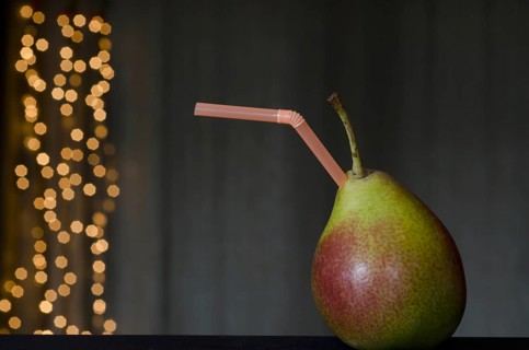 Pear Fruit with Plastic Straw
