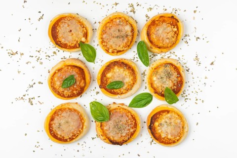 Nine small pizzas Margherita