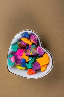 Dry colorful play dough in smal pieces