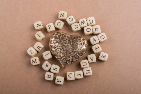 Metal Love icon and Letter cubes of made of wood