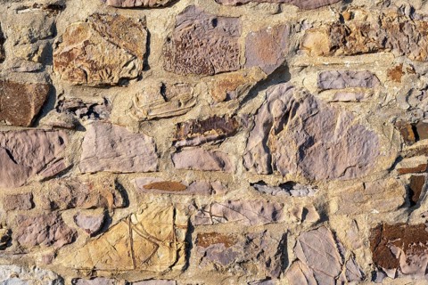 Wall stones of different types of stone