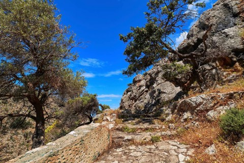 Typical Greek or Cretan landscape. Paved stairs down the hills and mountains