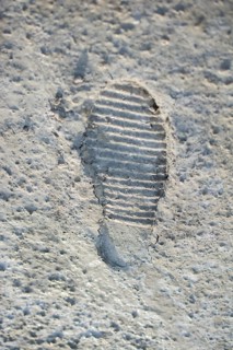 Footstep pattern seen on a concrete background