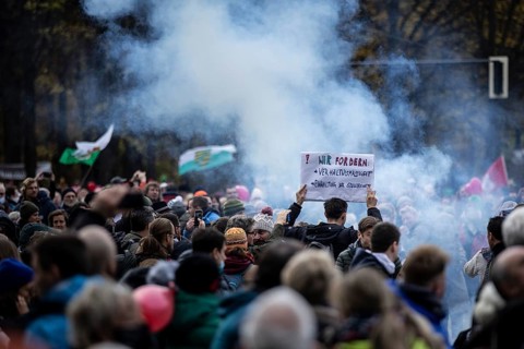 Demonstrators protest against the reform of the infection protection law