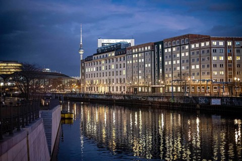 View of the Reichstag embankment and the Friedrichstrasse railway station In the background