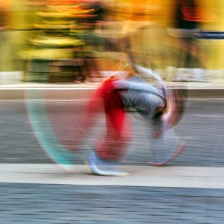 Colourful clown doing a cartwheel