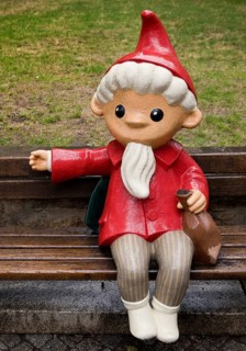 Sculpture of the Sandman on a bench