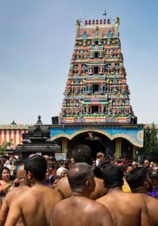Hindus on the main festival day at the temple festival in front of the Hindu temple Sri Kamadchi Ampal