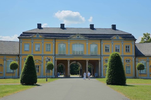 Baroque orangery with archway and kitchen garden