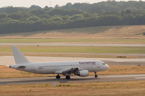 Passenger aircraft Airbus A320-214 of the airline Eurowings on the tarmac at Hamburg Airport