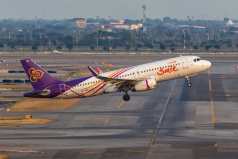 A Thai Smile Airbus A320 aircraft with registration HS-TXS at Bangkok Suvarnabhumi Airport