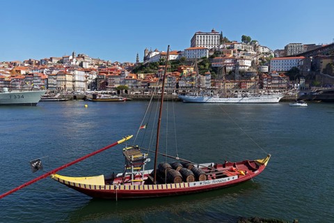 Historic boat with port wine barrels on the Douro River