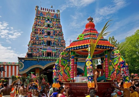 Hindus on the main festival day at the temple festival in front of the Hindu temple Sri Kamadchi Ampal