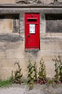 Royal Mail letterbox integrated into a house wall