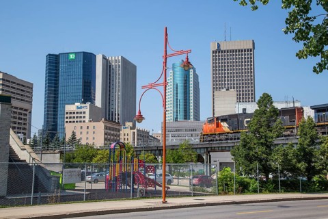 Canadian National Railway train in front of Skyline