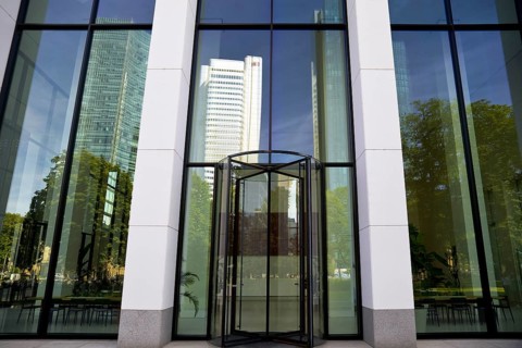 Reflection of the skyscrapers at the entrance to the Taunus Tower