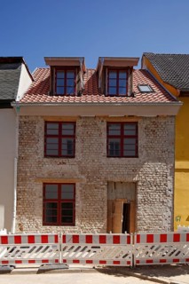 Core-rehabilitated residential building