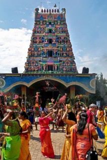 Hindus on the main festival day at the temple festival in front of the Hindu temple Sri Kamadchi Ampal
