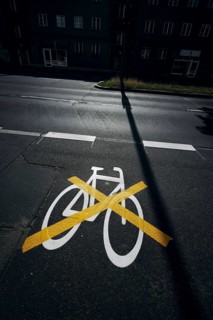The pictogram for a cycle path in Ollenhauerstrasse in Berlin Reinickendorf has been crossed with a yellow marking. The new transport administration in Berlin has stopped several cycle path projects i...