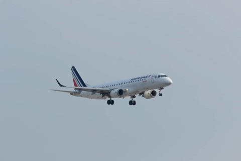 Passenger aircraft Embraer 190 of the airline Airfrance on approach to Hamburg Airport