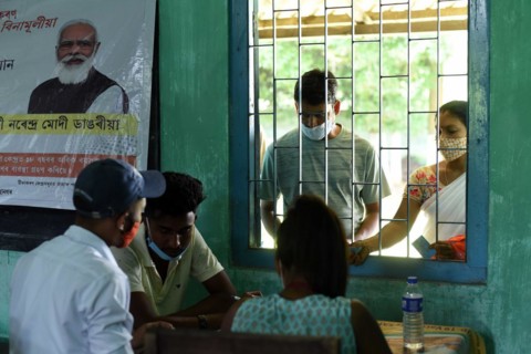 People registering to get COVID-19 coronavirus vaccine at a vaccination centre at Chandrapur in Kamrup district of Assam in India on Monday