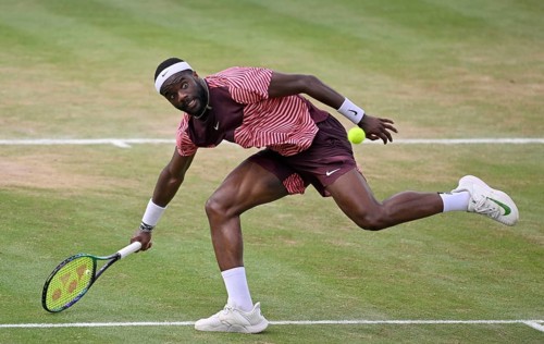 Frances Tiafoe USA converts his match point to win the title