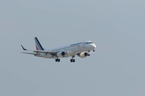 Passenger aircraft Embraer 190 of the airline Airfrance on approach to Hamburg Airport