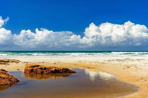 Gorgeous Pe de Serra beach in the town of Serra Grande on the south coast of Bahia on a sunny summer day